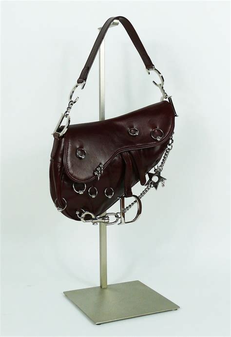 vintage dior pierced saddle bag|dior saddle bag original.